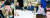문재인 대통령(오른쪽 사진)이 1일 청와대에서 시민사회단체 간담회 중 엄창환 전국청년정책네트워크 대표의 발언을 듣고 있다. [연합뉴스]