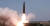 &#39;북한판 이스칸데르&#39; 미사일로 추정되는 전술유도무기가 날아가는 모습 [연합뉴스]