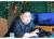 김정은 북한 국무위원장이 4일 원산 호도반도에서 단거리 발사체 시험을 지켜보고 있다.[조선중앙통신]