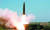 북한 조선중앙TV가 5일 전날 동해 해상에서 김정은 국무위원장 참관 하에 진행된 화력타격 훈련 사진을 방영했다. &#39;북한판 이스칸데르&#39; 미사일로 추정되는 전술유도무기가 날아가는 모습. [조선중앙TV]