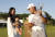 PGA 투어 AT&T 바이런 넬슨에서 우승한 강성훈. 시상식에서 아내 양소영 씨와 아들 유진군과 함께 기쁨을 나누고 있다. [AP=연합뉴스] 