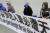 파룬궁 수련자들이 뉴욕의 중국 영사관 앞에서 중국 당국의 탄압에 항의하는 현수막을 앞에 두고 명상을 하고 있다. [AP 연합뉴스]