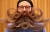 18일(현지시간) 벨기에 앤트워프에서 열린 2019 세계 수염·콧수염 선수권대회에서 한 참가자가 뒤통수 머리를 수염처럼 만들었다. [로이터=연합뉴스] 