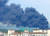 26일 오후 경남 김해시 한림면 한 조선기자재 공장에서 화재가 발생해 검은 연기가 퍼지고 있다. [독자제공=연합뉴스]