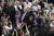 트럼프 미국 대통령과 아베 일본 총리가 26일 스모를 관전하는 동안 관객들이 스마트폰으로 그 장면을 찍고 있다. [교도=연합뉴스]  