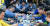 문재인 대통령(왼쪽 세 번째)이 24일 오전 경북 경주시 옥산마을을 방문, 모내기를 한 뒤 주민들과 함께 새참을 먹고 있다. [청와대사진기자단]