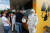 관광객들이 7일(현지시간) 원자력 발전소 사고 현장인 체르노빌의 기념품 상점앞에 서 있다. [EPA=연합뉴]