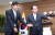 양정철 민주연구원장이 11일 오전 부산시청에서 오거돈 부산시장과 만나 악수를 나누고 있다. [뉴스1]