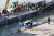 11일(현지시간) 헝가리 부다페스트 다뉴브강 머르기트 다리에서 크레인 클라크 아담호에 인양되고 있는 허블레아니호가 모습을 보이고 있다. [연합뉴스]