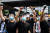 12일(현지시간) 검은 옷에 마스크를 쓴 시위대가 &#39;홍콩 입법회 앞에서 범죄인 인도 법안&#39;에 반대하며 구호를 외치고 있다. [AFP=연합뉴스]