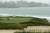 해변과 인접한 페블비치 골프링크 10번 홀에서 한 US 오픈 참가 선수가 연습을 하고 있다. [AFP=연합뉴스]