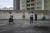  시민들이 19일 평양 거리에서 스마트폰을 사용하고 있다. [AFP=연합뉴스]