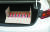 25일 오후 신원미상의 남자가 탄 승용차가 서울 종로구 주한미국대사관 정문을 들이받고 멈춰서 있다. 차량 트렁크에 부탄가스가 가득 실려있다. [연합뉴스]