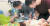 서울대병원 김민선 교수(오른쪽)와 원미현 간호사가 가정집에서 인공호흡기를 차고 있는 중증소아환자 다온이를 진료하고 있다. [최정동 기자]