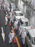 27일 오사카 시내 정상회담장으로 향하는 한 도로에서 경찰들이 통행하는 차량들을 검문하고 있다. [AFP=연합뉴스]
