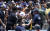 지난 24일 다저스타디움에서 열린 LA 다저스와 콜로라도 로키스의 경기. 1루 쪽 관중석에 앉아있던 여성 팬이 코디 벨린저의 파울 타구에 맞아 들것에 실려나가고 있다. [AP=연합뉴스]