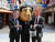 석탄을 손에 든 문재인 대통령과 아베 총리, 트럼프 대통령 가면을 쓴 시위대 모습. [로이터=연합뉴스]