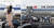  G20 정상회의에 참석하는 문재인 대통령과 김정숙 여사가 27일 오후 오사카 간사이 국제공항에 도착한 공군 1호기에서 내리고 있다. 오른쪽은 시진핑 중국 국가주석의 전용기가 27일 도착한 모습. [연합뉴스]