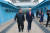 북한 김정은 국무위원장과 월경한 도널드 트럼프 미국 대통령이 지난달 30일 판문점 북측 지역에서 함께 이동하고 있다. [사진 노동신문]