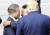 문재인 대통령이 30일 오후 판문점에서 도널드 트럼프 미국 대통령(오른쪽)과 만난 뒤 북으로 돌아가는 김정은 국무위원장을 포옹으로 배웅하고 있다. 연합뉴스