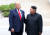 도널드 트럼프 미국 대통령이 지난달 30일 판문점 공동경비구역(JSA) 군사분계선에서 김정은 북한 국무위원장과 만나고 있다. [청와대사진기자단]
