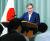 스가 요시히데 일본 관방장관이 9일 오전 정례 브리핑에서 한국에 대한 수출규제에 대해 철회 계획이 없다고 밝히고 있다. [AP=연합뉴스]