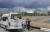 관광객들이 10일(현지시간) 체르노빌 원전 4호기 철제 방호 덮개를 촬영하고 있다. [EPA=연합뉴스] 
