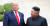 도널드 트럼프 미국 대통령이 6월 30일 판문점 공동경비구역(JSA) 군사분계선에서 김정은 북한 국무위원장과 만나고 있다. [청와대사진기자단]