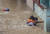 12일 (현지시간) 네팔 카트만두에서 폭우가 쏟아지자 한 남성이 딸을 데리고 침수 지역을 탈출하고 있다. [EPA=연합뉴스]