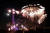 14일 밤 기념일을 축하하는 불꽃들이 에펠탑 주위에서 터지고 있다.[로이터=연합뉴스]
