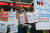 민주노총 서비스연맹 택배연대노조원들이 24일 서울 종로구 옛 일본대사관 앞에서 기자회견을 열고 일본 브랜드 &#39;유니클로&#39; 제품 배송 거부를 선언하고 있다. [뉴스1]