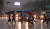 중부지방에 호우경보가 발효된 26일 서울 종로구 광화문광장에서 우산을 쓴 시민들이 길을 건너고 있다. [연합뉴스]