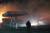 지난 5일 오전 강원도 속초시 미시령로의 한 LPG 충전소에서 소방대원들이 충전소 주위로 옮겨 붙은 불을 끄기 위해 준비작업을 하고 있다. [연합뉴스]