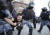 27일(현지시간) 러시아 모스크바에서 열린 대규모 시위에서 진압에 나선 경찰들이 시위 참가자를 진압하고 있다. [EPA=연합뉴스]