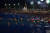 전국이 열대야 현상을 보인 28일 밤 야간개장한 속초해수욕장에서 사람들이 물놀이를 하고 있다. [사진 연합뉴스]