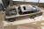 뉴욕 소더비 경매장에 등장한 애스턴마틴 DB5. 왼쪽 아래에 제임스 본드가 탔던 차량임을 설명해주는 문구가 적혀있다.[AP=연합뉴스]