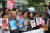 아베규탄 시민행동 회원들이 2일 오후 서울 종로구 일본대사관 앞에서 기자회견을 열고 화이트국가에서 한국을 배제한 일본 정부를 규탄하고 있다. [뉴스1]