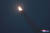 지난 6일 새벽 발사된 북한 신형전술유도탄이 날아가는 장면. [조선중앙통신=연합뉴스]