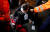 지난 11일 침사추이 지역의 송환법(범죄인 인도법) 반대 시위에서 경찰이 쏜 진압 장비 탄환에 맞은 여성이 치료를 받고 있다. [로이터=연합뉴스]