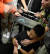 13일 밤 홍콩 공항에서 시위대에 붙들린 중국 남성이 중국에서 온 공안이라는 의혹 속에 구타를 당해 거의 실신 상태에 빠져 있다. [중국 환구망]