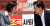 황교안 자유한국당 대표와 나경원 원내대표가 21일 서울 여의도 국회에서 열린 의원총회에서 대화를 하고 있다. [뉴스1]