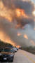 24일 볼리비아 산타 크루즈의 Aguas Calientes에서 대형 산불이 발생해 연기가 하늘을 덮고 있다. [로이터=연합뉴스]