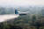 브라질 C-130 헤라클레스 항공기에서 24 일 브라질 아마존 열대 우림 화재지역에 소화액을 뿌리고 있다. [AP=연합뉴스]