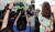 고유정이 2일 오후 두 번째 재판을 받기 위해 제주지법으로 안에 들어가는 모습을 촬영하기 위해 시민들이 스마트폰을 들어 사진을 찍고 있다. [뉴스1] [연합뉴스]