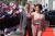 문재인 대통령과 부인 김정숙 여사가 6일 라오스 와타이 국제공항에서 환송식을 하고 있다. [뉴시스]