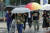 전국에 가을비가 내리는 5일 오후 서울 광화문 네거리에서 시민들이 우산을 쓴채 걸어가고 있다. 기상청은 11일 오전까지 중부지방에 최고 200mm의 많은 비가 내리겠다고 예보했다. [뉴스1]