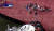 미국 해안경비대(USCG)가 미국 동부 해안에서 전도된 현대글로비스의 자동차운반선 골든레이호 안에 갇혀 있던 마지막 한국인 선원을 구조하고 있다. [액션뉴스잭스 캡처]