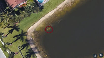 "호수 안에 수상한 車"···22년전 실종男, 구글어스가 찾았다