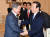 문재인 대통령(왼쪽)이 지난해 12월 14일 오전 청와대에서 누카가 후쿠시로 일한의원연맹 회장을 비롯한 대표단과 인사를 나누고 있다. [청와대사진기자단]