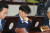 조국 법무부 장관이 24일 오전 서울 종로구 정부서울청사에서 열린 국무회의에서 자료를 보며 생각에 잠겨 있다. [뉴스1]